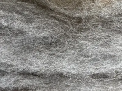 Image of silver-grey alpaca fibre rovings laid next to each other